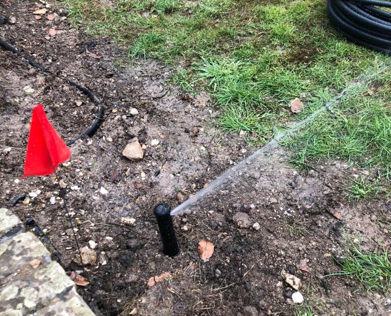 automatic water sprinkler in action